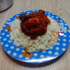 White rice and palm oil stew