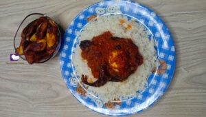 white rice with palm oil stew and dodo