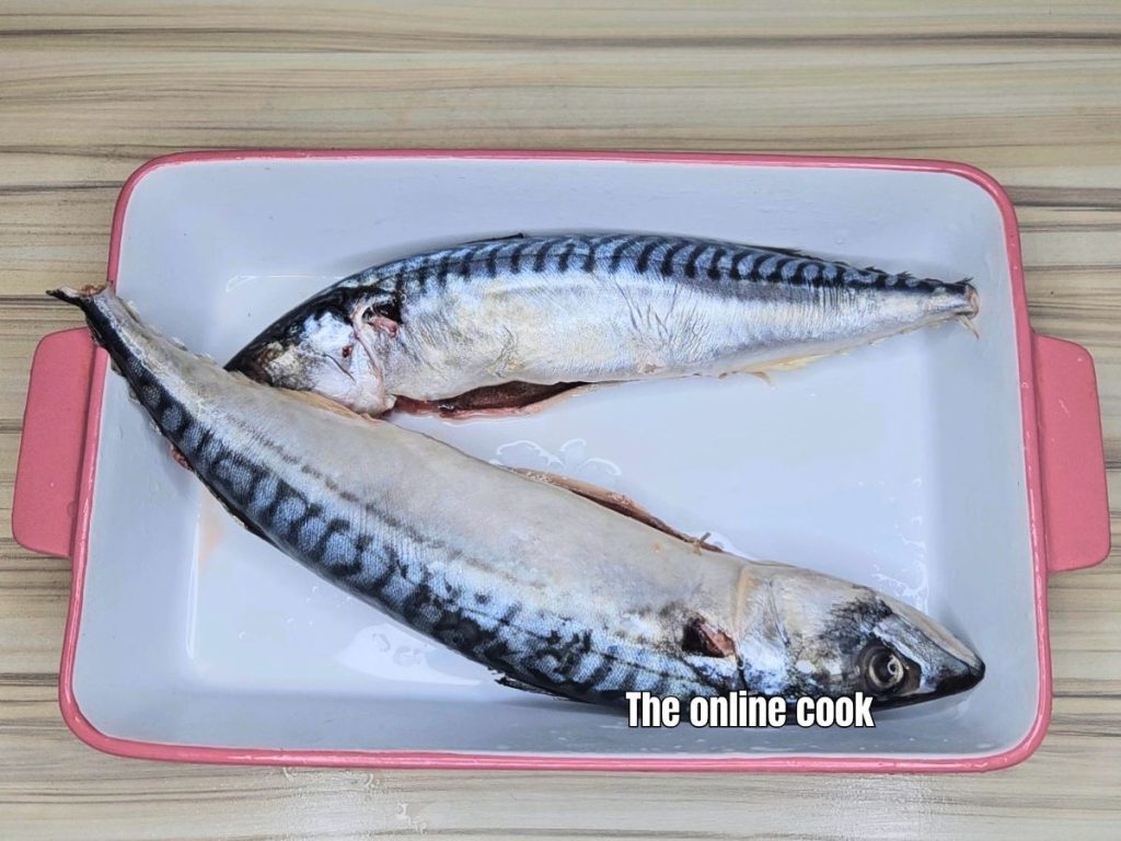 Whole fish in a bowl after cleaning